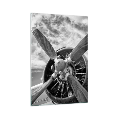 Obraz na szkle - Czarno-białe zdjęcie śmigła samolotu na tle dynamicznego nieba - 70x100cm - Pogromca przestworzy - Nowoczesna dekoracja ścienna do salonu i sypialni ARTTOR