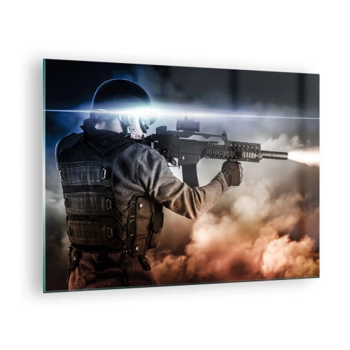 Obraz na szkle - Żołnierz w akcji strzelający z karabinu na tle dymu - 70x50cm - Po prostu bohater - Nowoczesna dekoracja ścienna do salonu i sypialni ARTTOR