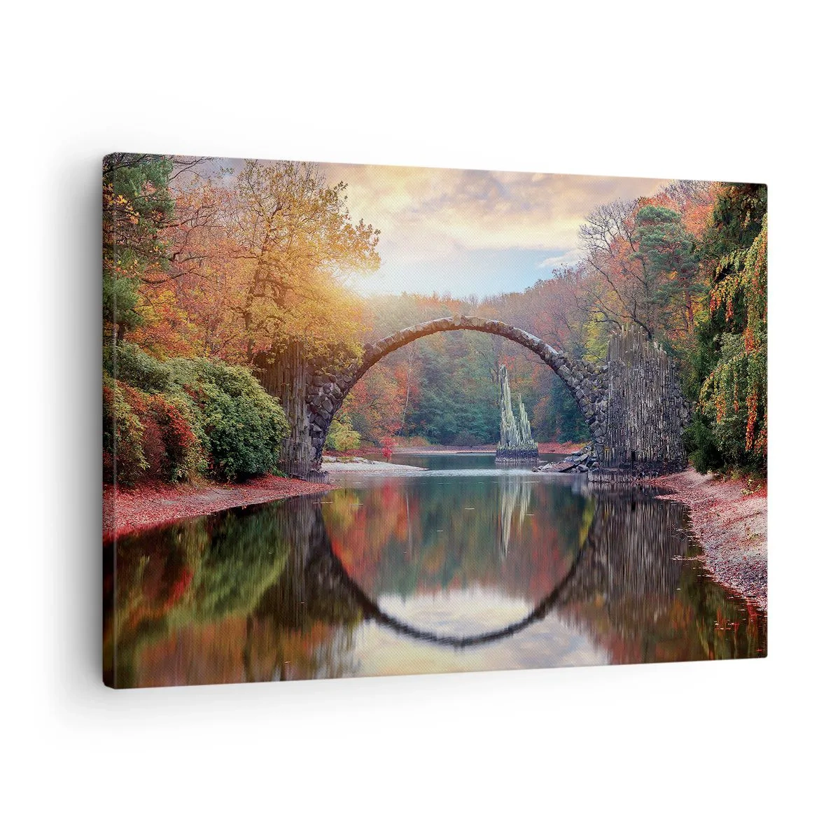 Obraz na płótnie - Po drugiej stronie lustra - Kamienny most w jesiennej scenerii nad spokojną wodą - 70x50cm