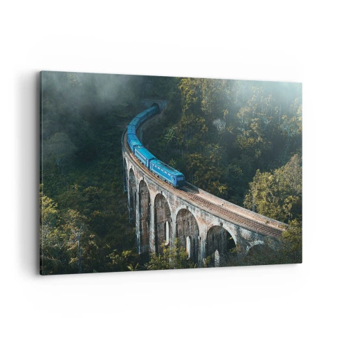 Obraz na płótnie - Niebieski pociąg na zabytkowym wiadukcie wśród lasów - 100x70cm - Pociąg do natury - Nowoczesna dekoracja ścienna do salonu, kuchni i sypialni ARTTOR