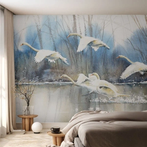 Fototapeta Premium Canvas - Łabędzie w locie nad zamarzniętym jeziorem w zimowym krajobrazie - 100x70cm - Jak w baśni o dzikich łabędziach - Nowoczesna dekoracja ścienna do salonu i sypialni ARTTOR