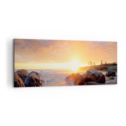 Obraz na płótnie - Zachód słońca nad kamienistym wybrzeżem - 120x50cm - Świetlista bryza wieczoru - Nowoczesna dekoracja ścienna do salonu i sypialni ARTTOR