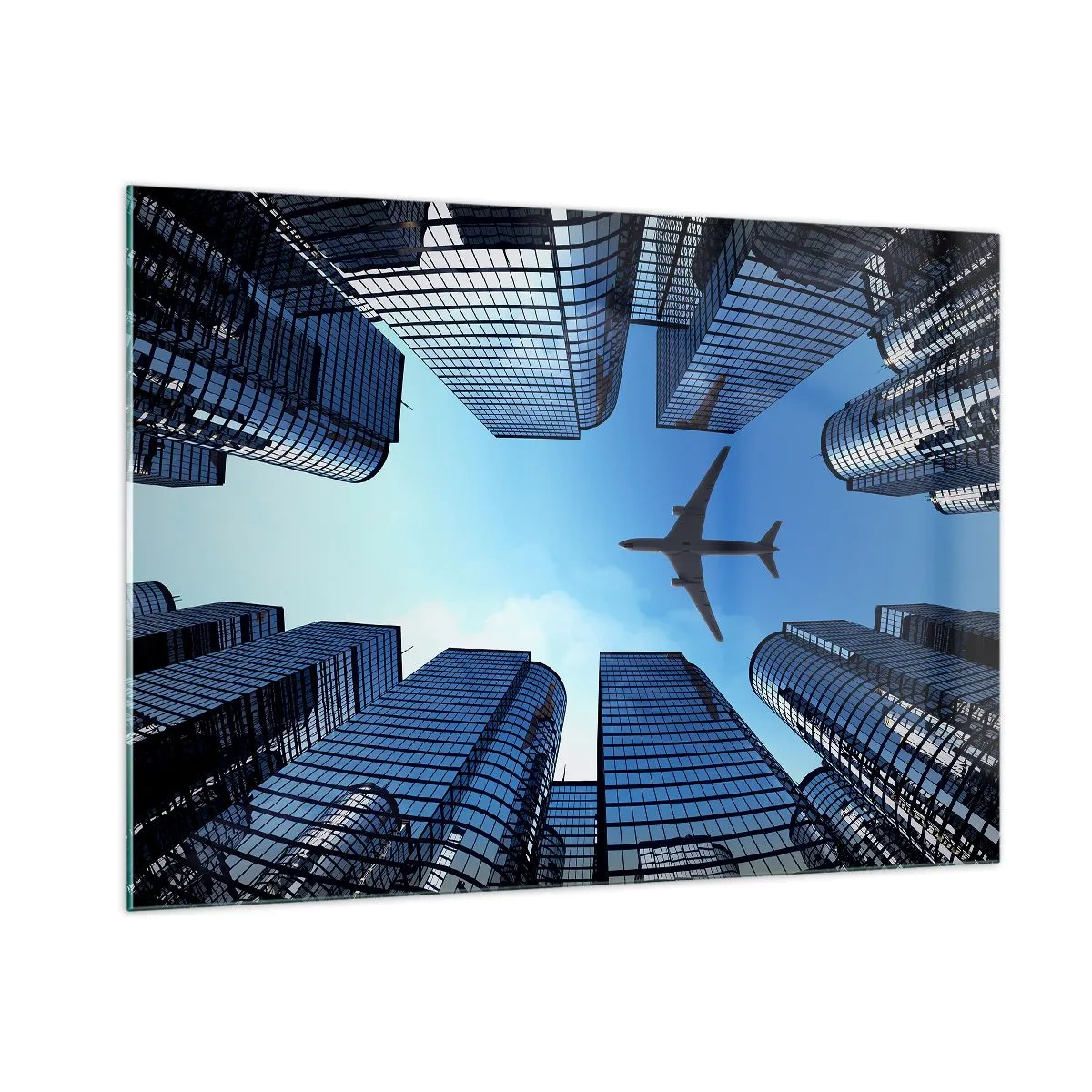 Obraz na szkle - Widok na samolot między drapaczami chmur - 100x70cm - Widok ze szklanego wąwozu - Nowoczesna dekoracja ścienna do salonu, kuchni i sypialni ARTTOR
