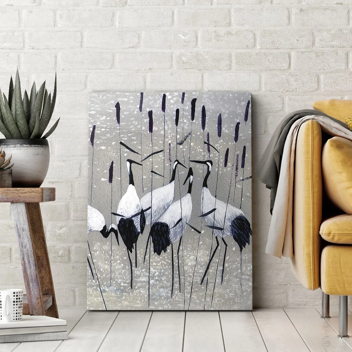 Obraz na płótnie - Wśród swoich - Grupa żurawi wśród trzcin w subtelnej kolorystyce - 50x70cm