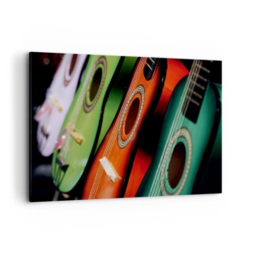 Obraz na płótnie - Kolorowe gitary w różnych odcieniach ułożone w szeregu - 100x70cm - Gitara ma wiele barw - Nowoczesna dekoracja ścienna do salonu, kuchni i sypialni ARTTOR