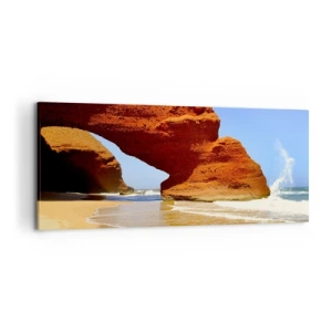 Obraz na płótnie - Naturalny łuk skalny na plaży z błękitnym niebem i falami - 120x50cm - Woda i wiatr przez tysiące lat - Nowoczesna dekoracja ścienna do salonu i sypialni ARTTOR