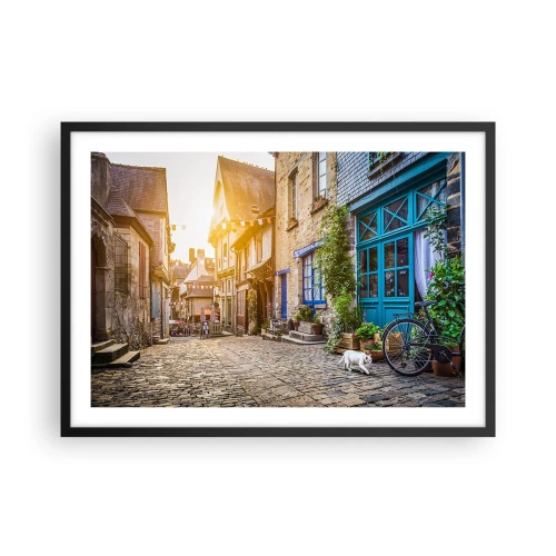 Plakat w czarnej ramie - Urokliwa uliczka z kamiennym brukiem w świetle słońca - 70x50cm - Biały duch miasteczka - Nowoczesna dekoracja ścienna do salonu i sypialni ARTTOR
