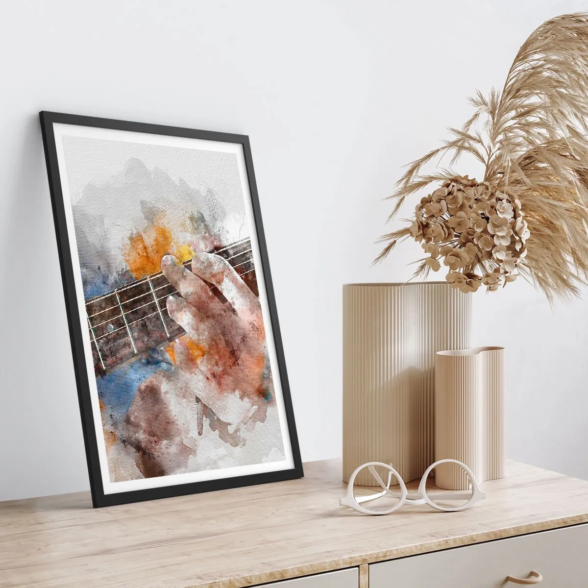 Plakat w czarnej ramie - Artystyczna ręka grająca na gitarze w akwarelowym stylu - 50x70cm - Poezja między strunami - Nowoczesna dekoracja ścienna do salonu i sypialni ARTTOR