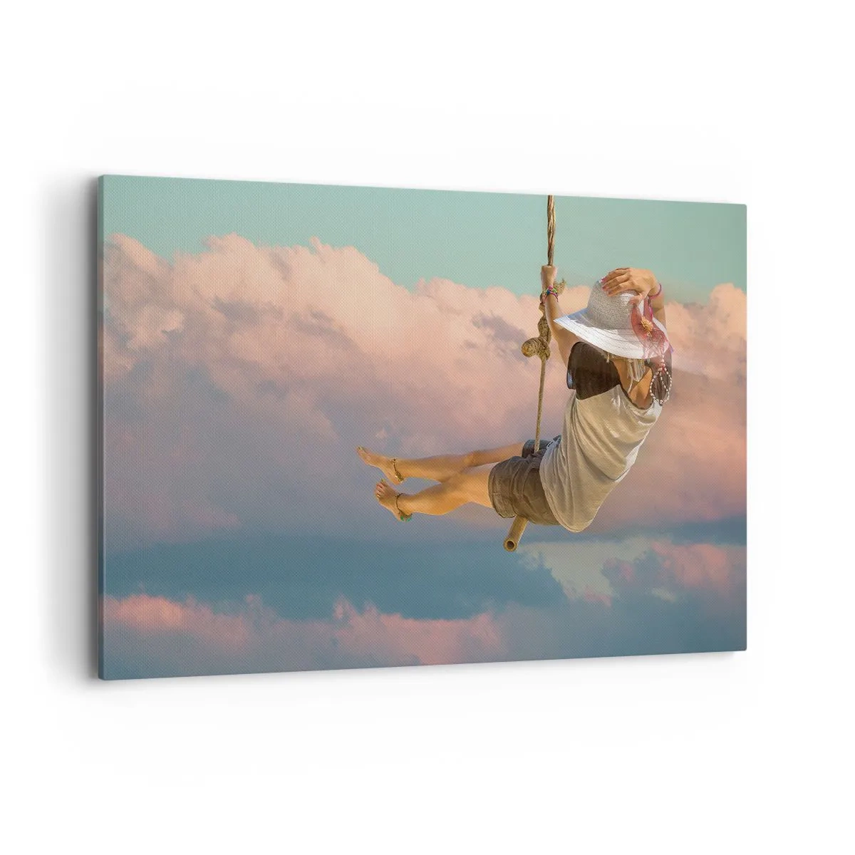 Obraz na płótnie - Kobieta na huśtawce wśród różowych chmur - 120x80cm - Zabawa w obłokach - Nowoczesna dekoracja ścienna do salonu, kuchni i sypialni ARTTOR