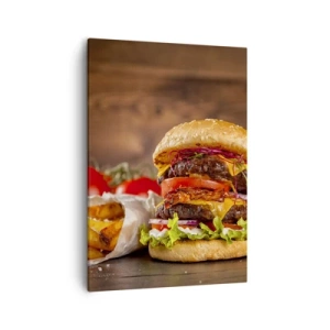 Obraz na płótnie - Soczysty burger z warzywami i serem podany z frytkami - 50x70cm - Zakazany owoc - Nowoczesna dekoracja ścienna do salonu, kuchni i sypialni ARTTOR