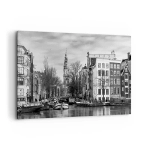 Obraz na płótnie - Czarno-biała panorama Amsterdamu z kanałem i zabytkowymi budynkami - 120x80cm - Amsterdamskie klimaty - Nowoczesna dekoracja ścienna do salonu, kuchni i sypialni ARTTOR