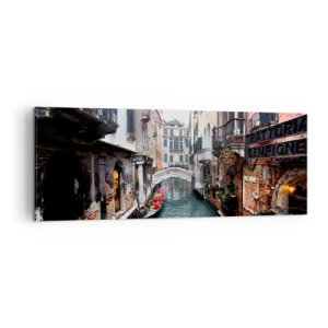 Obraz na płótnie - Kanał w Wenecji z gondolą i zabytkowymi kamienicami - 140x50cm - Pejzaż wenecki z gondolą i mostkiem - Nowoczesna dekoracja ścienna do salonu i sypialni ARTTOR