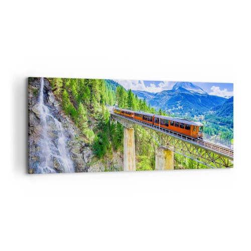 Obraz na płótnie - Górska kolejka na moście z widokiem na wodospad i góry - 120x50cm - Kolej na Alpy - Nowoczesna dekoracja ścienna do salonu i sypialni ARTTOR