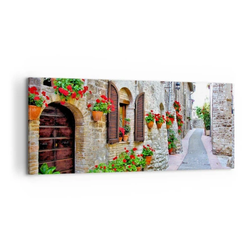 Obraz na płótnie - Wąska uliczka z kamiennymi budynkami ozdobiona doniczkami z kwiatami - 120x50cm - Włoskie klimaty - Nowoczesna dekoracja ścienna do salonu i sypialni ARTTOR