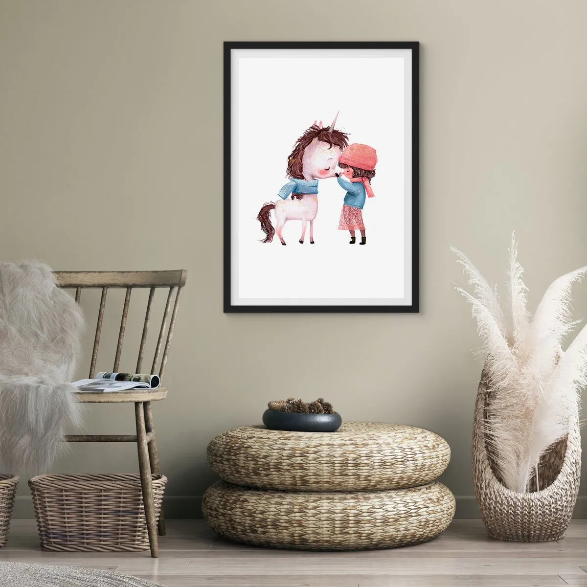 Plakat w czarnej ramie - Zimowa opowieść - Dziewczynka i jednorożec w zimowych ubraniach przytulają się - 50x70cm