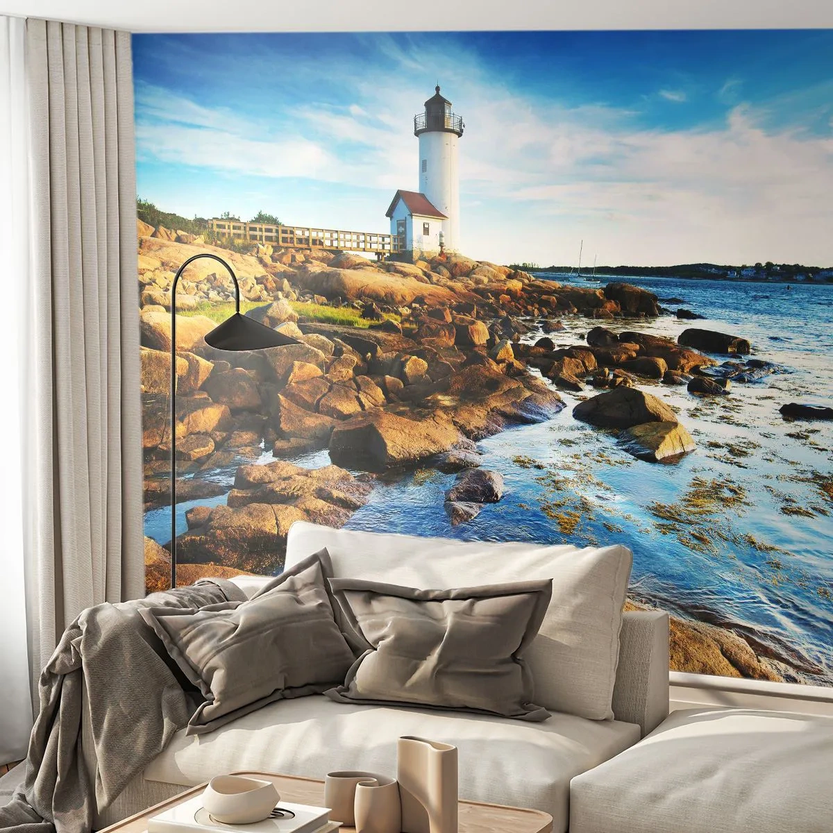 Fototapeta Premium Sand - Latarnia morska na skalistym wybrzeżu o zachodzie słońca - 100x70cm - Wracajcie szczęśliwie, czekam - Nowoczesna dekoracja ścienna do salonu, kuchni i sypialni ARTTOR
