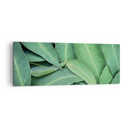 Obraz na płótnie - Zbliżenie na zielone liście tworzące naturalny wzór - 140x50cm - Soczyste i świeże - Nowoczesna dekoracja ścienna do salonu i sypialni ARTTOR