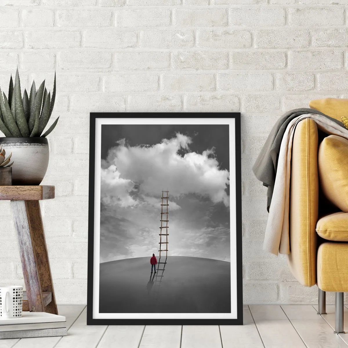 Plakat w czarnej ramie - Człowiek stojący przy drabinie prowadzącej do chmur - 50x70cm - Wszystko możliwe - Nowoczesna dekoracja ścienna do salonu i sypialni ARTTOR