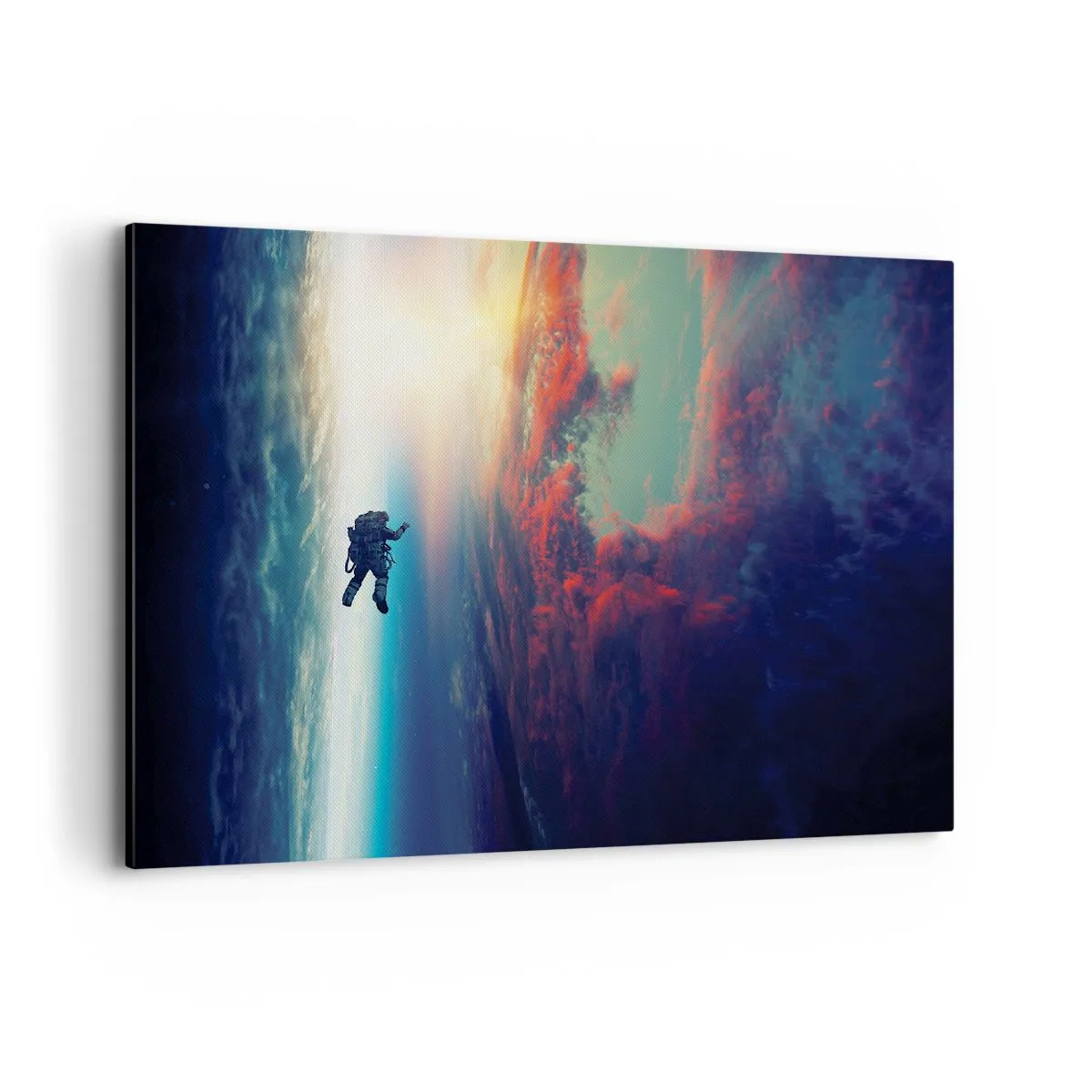 Obraz na płótnie - Astronauta unoszący się w kosmosie nad kolorową Ziemią - 100x70cm - Mierzyć się ze wszechświatem - Nowoczesna dekoracja ścienna do salonu, kuchni i sypialni ARTTOR