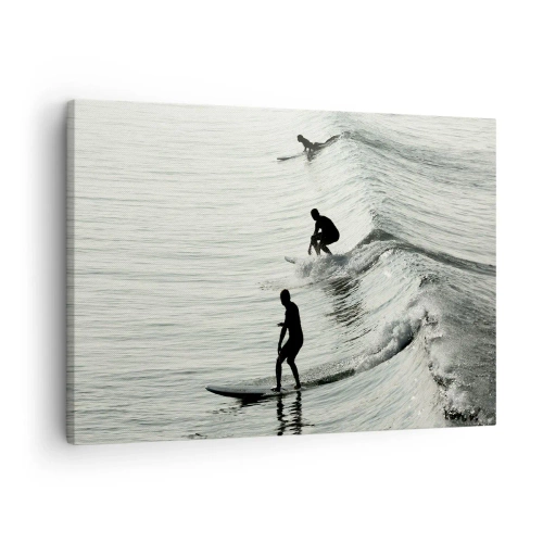 Obraz na płótnie - Surferzy na falach w monochromatycznym ujęciu - 70x50cm - Na spotkanie fali - Nowoczesna dekoracja ścienna do salonu i sypialni ARTTOR