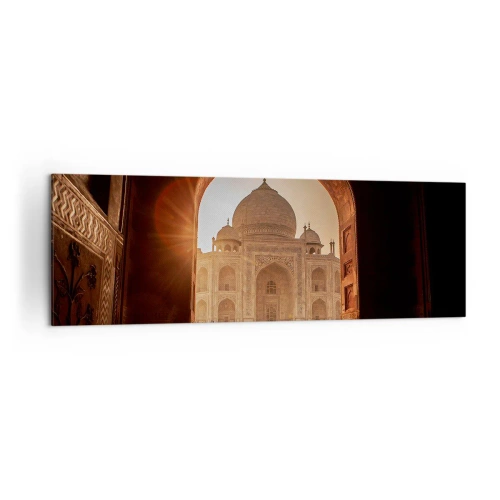 Obraz na płótnie - Taj Mahal w promieniach słońca widziany z łuku bramy - 160x50cm - Pomnik nieziemskiej miłości - Nowoczesna dekoracja ścienna do salonu i sypialni ARTTOR
