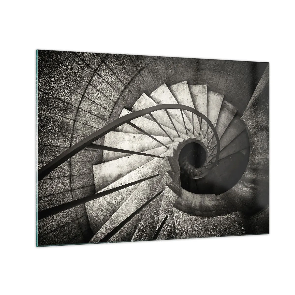 Obraz na szkle - Czarno-białe spiralne schody z perspektywy lotu ptaka - 70x50cm - Schodami w górę, schodami w dół - Nowoczesna dekoracja ścienna do salonu i sypialni ARTTOR