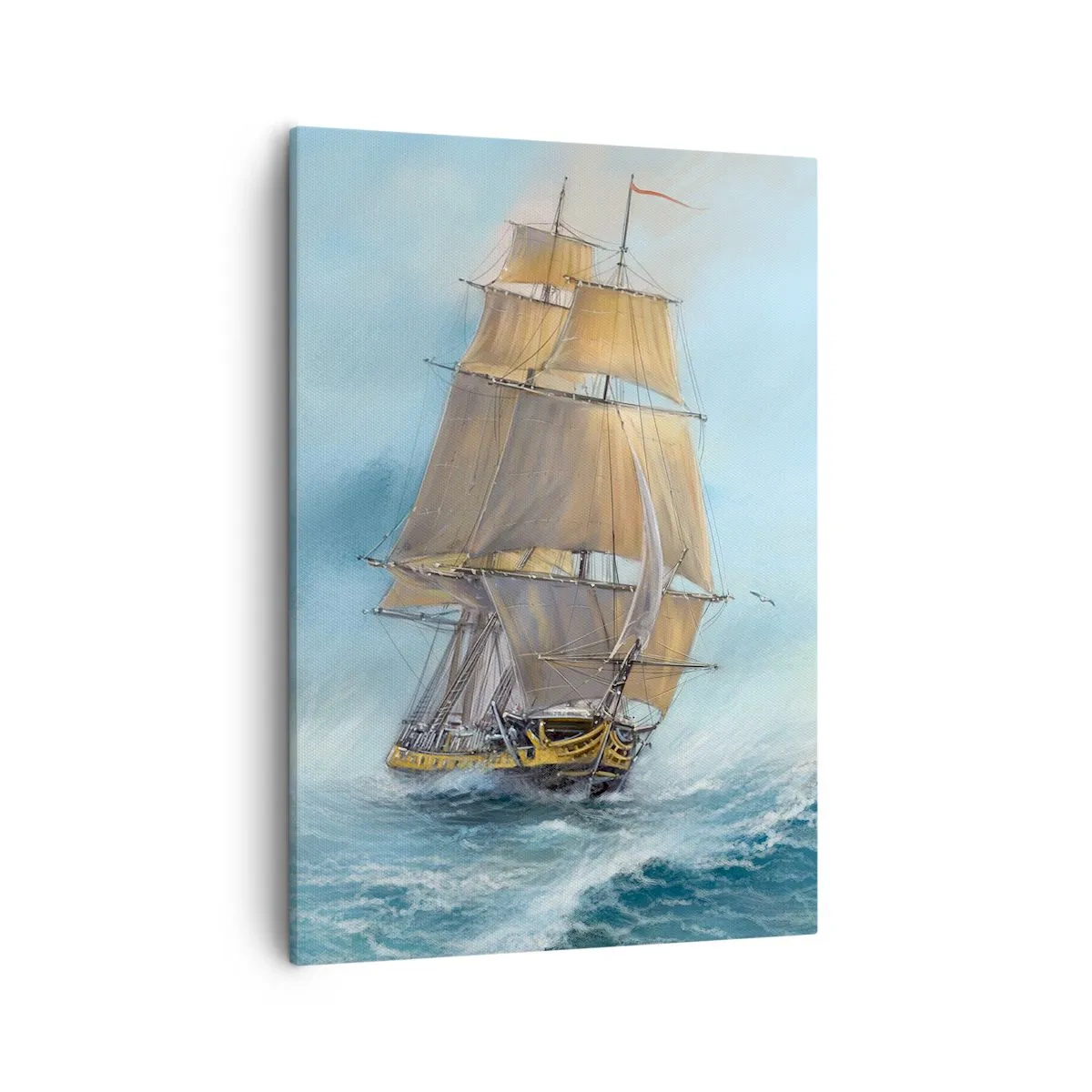 Obraz na płótnie - Żaglowiec na wzburzonym morzu pod błękitnym niebem - 50x70cm - Mknący po falach - Nowoczesna dekoracja ścienna do salonu, kuchni i sypialni ARTTOR