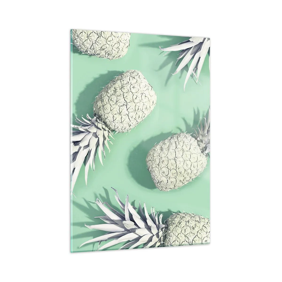 Obraz na szkle - Białe ananasy na miętowym tle w artystycznej kompozycji - 50x70cm - świetnie komponują się z miętą - Nowoczesna dekoracja ścienna do salonu, kuchni i sypialni ARTTOR