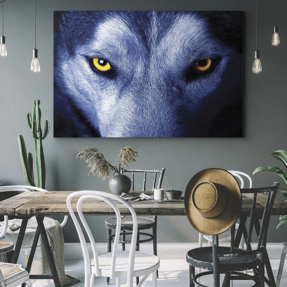 Obraz na płótnie - Intensywne spojrzenie wilka w zbliżeniu na ciemnym tle - 70x50cm - Hipnotyzujące spojrzenie - Nowoczesna dekoracja ścienna do salonu i sypialni ARTTOR