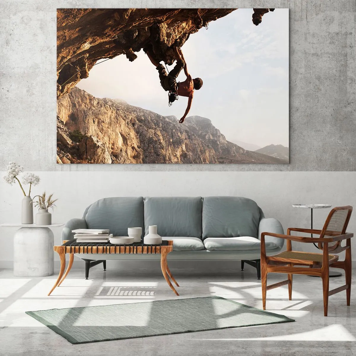Obraz na szkle - Wspinaczka na pionowej skale w górskim krajobrazie - 100x70cm - Świat skurczony w garści na obrywie głazu - Nowoczesna dekoracja ścienna do salonu, kuchni i sypialni ARTTOR