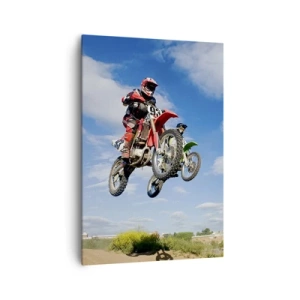 Obraz na płótnie - Zawodnicy na motocyklach crossowych w powietrzu podczas skoku - 70x100cm - Podniebny skok - Nowoczesna dekoracja ścienna do salonu i sypialni ARTTOR