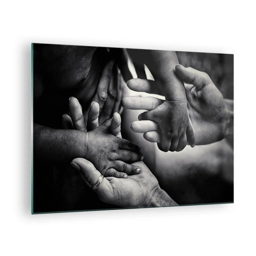 Obraz na szkle - Symboliczne ujęcie dłoni w czerni i bieli różnych pokoleń - 70x50cm - Być człowiekiem - Nowoczesna dekoracja ścienna do salonu i sypialni ARTTOR