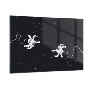 Obraz na szkle - Dwóch astronautów unoszących się w przestrzeni kosmicznej - 120x80cm - Kosmiczny pląs - Nowoczesna dekoracja ścienna do salonu, kuchni i sypialni ARTTOR