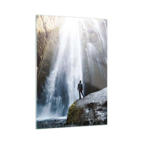 Obraz na szkle - Człowiek stojący na skale przed potężnym wodospadem w świetle słońca - 50x70cm - Przywrócenie proporcji - Nowoczesna dekoracja ścienna do salonu, kuchni i sypialni ARTTOR