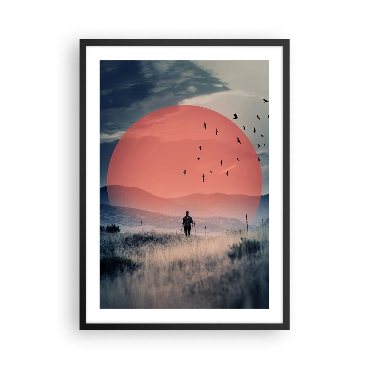 Plakat w czarnej ramie - W swoich żywiołach - Mężczyzna idący przez pole na tle czerwonego słońca - 50x70cm