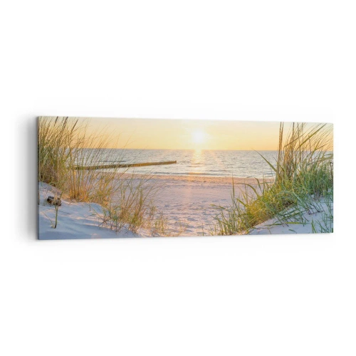 Obraz na płótnie - Piaszczysta plaża z widokiem na zachodzące słońce nad morzem - 140x50cm - Morza szum, ptaków śpiew, dzika plaża pośród traw… - Nowoczesna dekoracja ścienna do salonu i sypialni ARTTOR