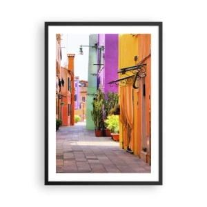 Plakat w czarnej ramie - Kolorowa uliczka z roślinami i żywymi elewacjami budynków - 50x70cm - Tęczowy zaułek - Nowoczesna dekoracja ścienna do salonu i sypialni ARTTOR
