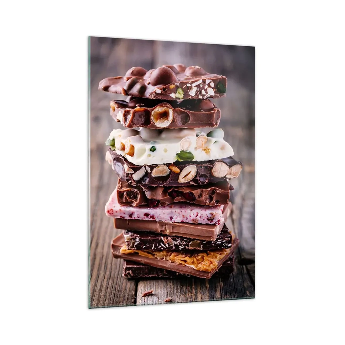 Obraz na szkle - Apetyczna kompozycja warstw czekolady z orzechami, owocami i bakaliami na drewnianym tle - 70x100cm - Rozkoszna perspektywa - Nowoczesna dekoracja ścienna do salonu i sypialni ARTTOR