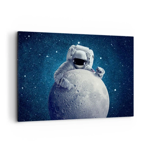 Obraz na płótnie - Astronauta trzymający księżyc na tle rozgwieżdżonego nieba - 120x80cm - Kosmiczny żartowniś - Nowoczesna dekoracja ścienna do salonu, kuchni i sypialni ARTTOR