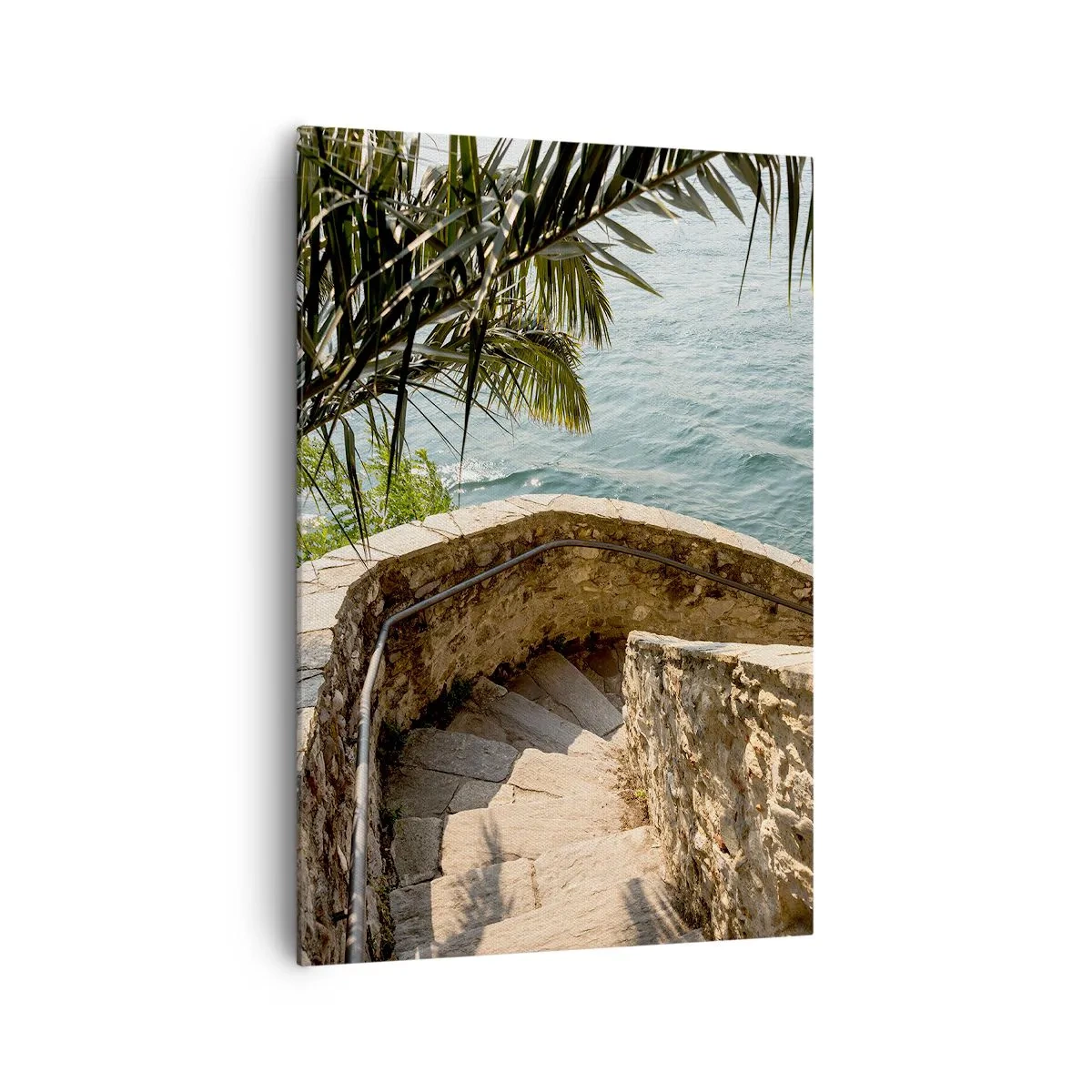 Obraz na płótnie - Kamienne schody prowadzące w dół nad turkusową wodę otoczoną palmami - 70x100cm - Pod słońcem Italii - Nowoczesna dekoracja ścienna do salonu i sypialni ARTTOR