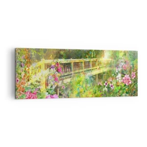 Obraz na płótnie - Most w otoczeniu bujnej roślinności i kwiatów - 140x50cm - Mostek wiosennych westchnień - Nowoczesna dekoracja ścienna do salonu i sypialni ARTTOR