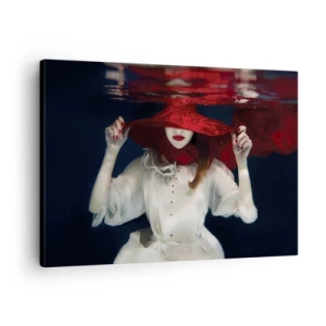 Obraz na płótnie - Kobieta w czerwonym kapeluszu zanurzona w wodzie - 70x50cm - Dziwożona - Nowoczesna dekoracja ścienna do salonu i sypialni ARTTOR