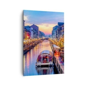 Obraz na płótnie - Kanał z oświetleniem w otoczeniu kolorowych budynków - 70x100cm - Wieczór światła i zabawy - Nowoczesna dekoracja ścienna do salonu i sypialni ARTTOR