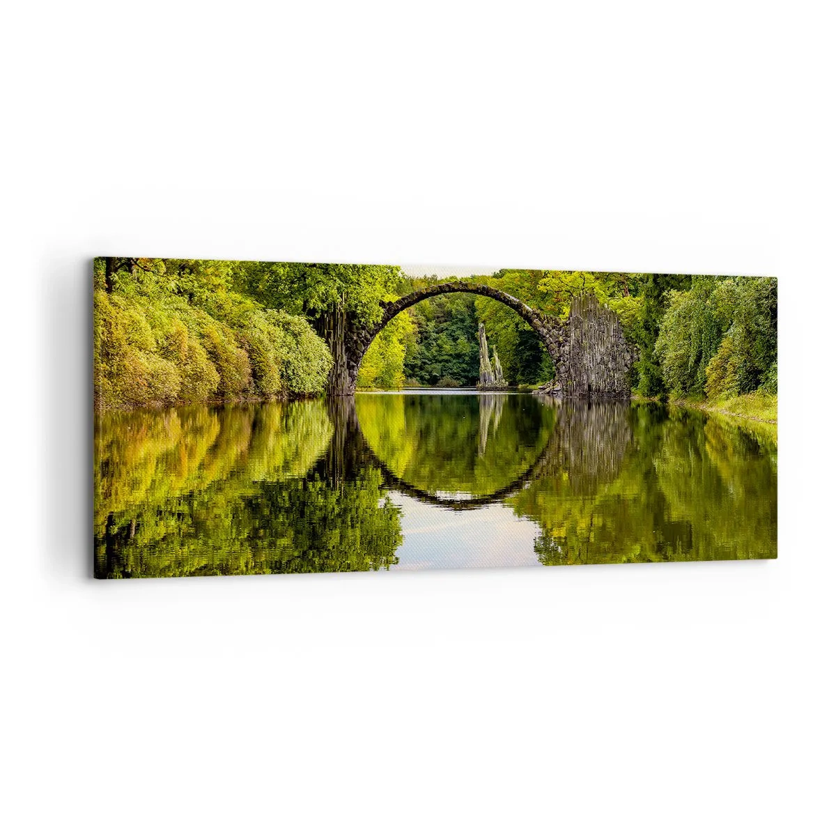 Obraz na płótnie - Kamienny most nad rzeką z perfekcyjnym odbiciem w wodzie - 120x50cm - Na styku dwóch światów - Nowoczesna dekoracja ścienna do salonu i sypialni ARTTOR