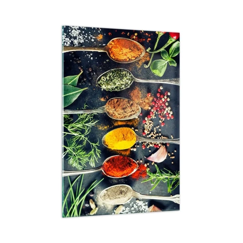 Obraz na szkle - Kolorowe przyprawy na łyżkach z ziołami w tle - 70x100cm - Kulinarna magia - Nowoczesna dekoracja ścienna do salonu i sypialni ARTTOR