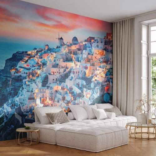 Fototapeta Premium Sand - Santorini o zachodzie słońca z podświetlonymi domami - 100x70cm - Twoje wielkie greckie wakacje - Nowoczesna dekoracja ścienna do salonu, kuchni i sypialni ARTTOR