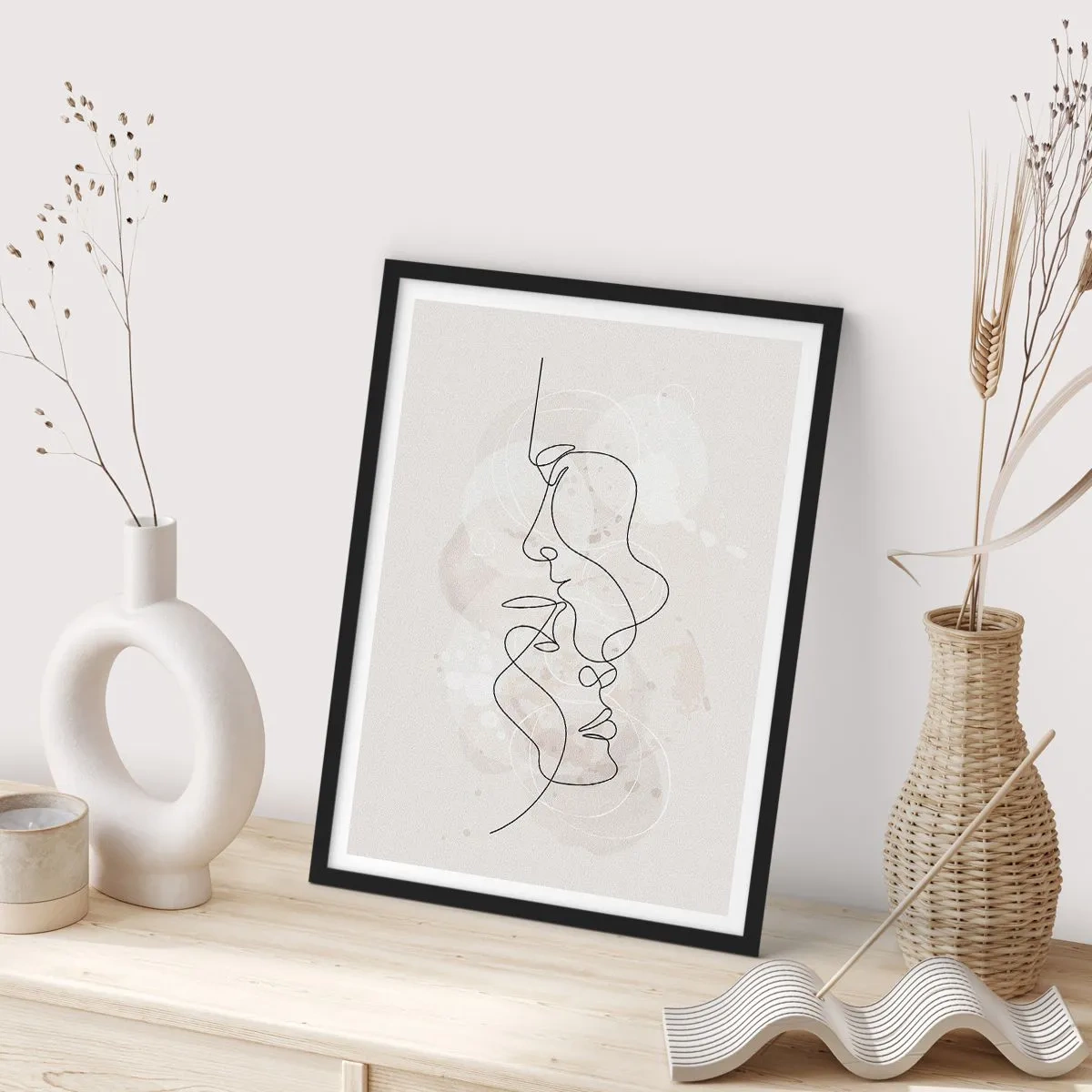 Plakat w czarnej ramie - Minimalistyczna grafika twarzy stworzona za pomocą jednej linii - 50x70cm - Splątani w uścisku - Nowoczesna dekoracja ścienna do salonu i sypialni ARTTOR