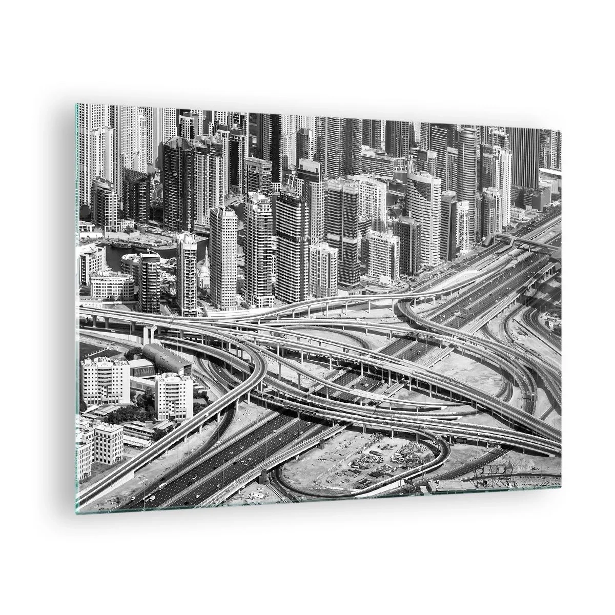 Obraz na szkle - Czarno-biała panorama miasta z węzłem autostradowym - 70x50cm - Dubaj – miasto niemożliwe - Nowoczesna dekoracja ścienna do salonu i sypialni ARTTOR