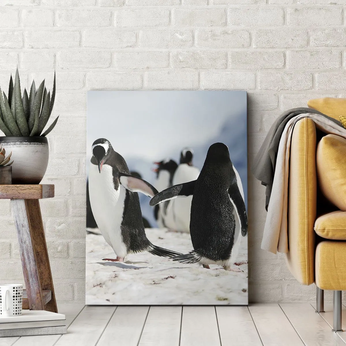 Obraz na płótnie - Grupa pingwinów na śniegu w antarktycznym krajobrazie - 80x120cm - Taniec na śniegu - Nowoczesna dekoracja ścienna do salonu i sypialni ARTTOR