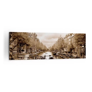 Obraz na płótnie - Rowerowy mostek nad kanałem w sepia - 160x50cm - Holenderskie klimaty - Nowoczesna dekoracja ścienna do salonu i sypialni ARTTOR